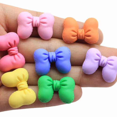 Muestra gratis Lovely Bowknot Kids Hair Bow Accesorio Encantos Kawaii Resina Decoración artesanal Mini adornos