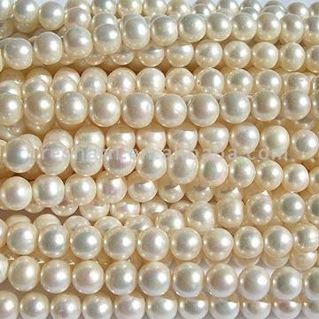 White Near Round Pearl Strands