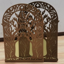 Metal hollow-out tree book stand by book