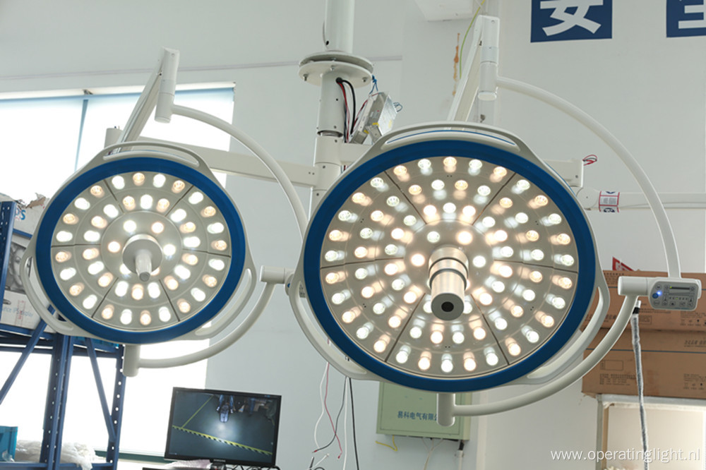 Operating surgical lamp with double heads