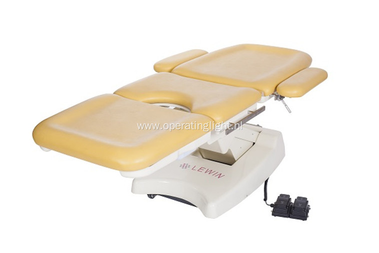 Red color gynecology table for obstetric examination