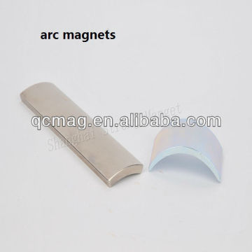 Arc shaped motor magnets