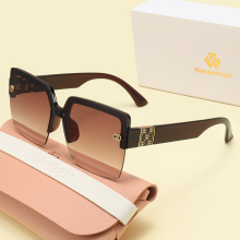 Women's Oversize Designer Sun Glasses with Engraved Logo