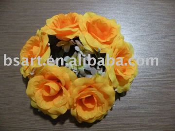 assorted artificial orange funeral wreath