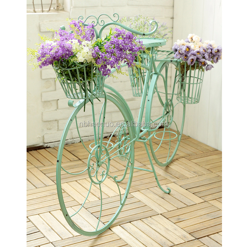 American country color bike model with flower basket on the ground decoration wedding flower shop clothing cafe decoration