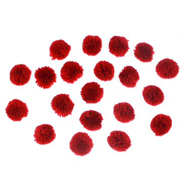 Brown yarn craft pompom ball