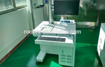 Laser marking caving machine for scissors caving on toner cartridge