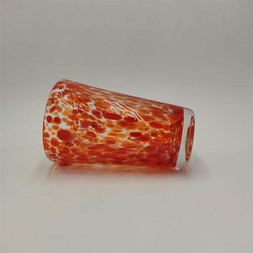 Swirled glass orange color highball glass