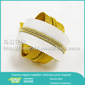 Golden color white tape nylon zipper special design nylon zipper