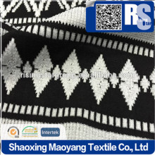 KNITTED T/R DOUBLE JACQUARD STRETCH FABRIC IN BLACK+PFD