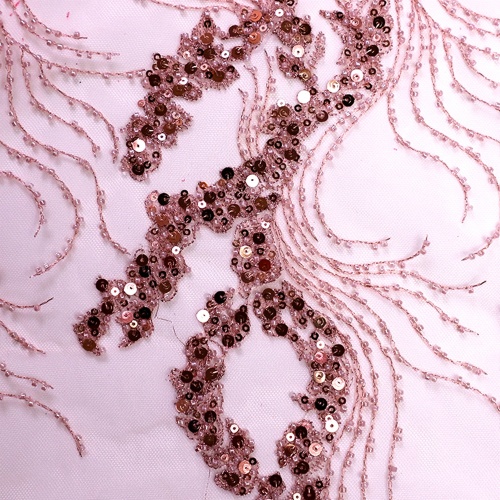 Pizzo a rete ricamato con paillettes rosa sporco