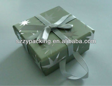 silver paper gift box with bowknot and ribbon handle