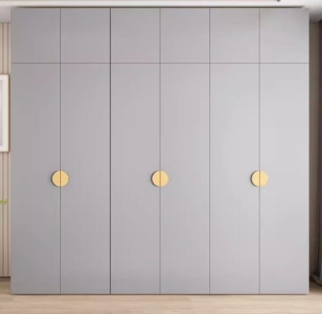 Modern fitted wardrobes around bed