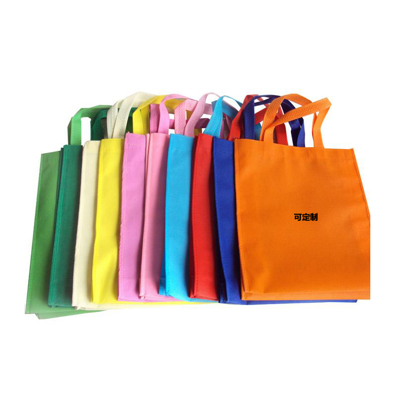 Custom hand-held nonwoven bag