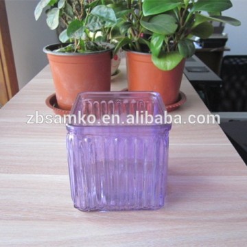 Colored square glass candle jar
