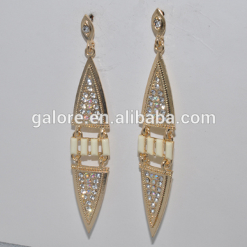 high quality fashion magnetic stone dangle gold earrings.