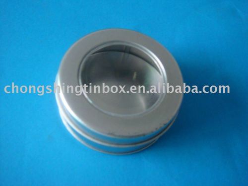 round tin box with clear window