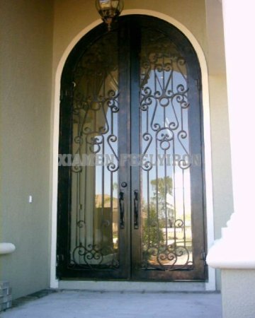 Entrance door arch top wrought iron door