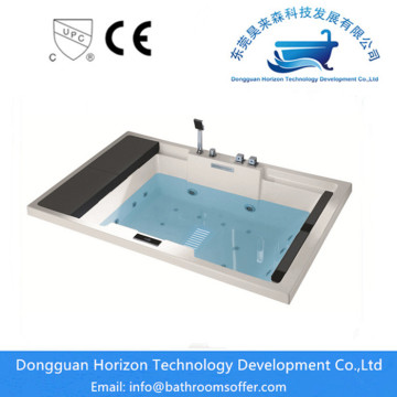 Hand Control freestanding jetted tub