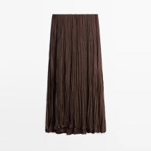 Women's flowing and elegant pleated half length skirt