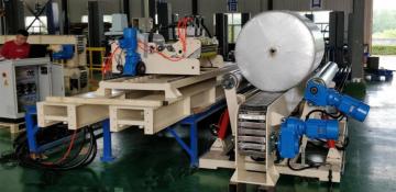 V-Slat conveyor for paper roll and reels