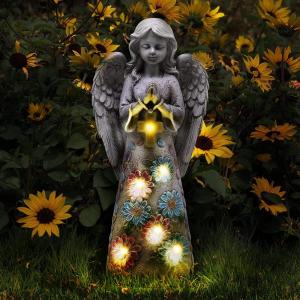 Figura de jardín de ángel Estatua en el jardín al aire libre