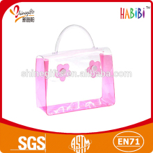 colorized floriferous pvc bag with button