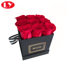 Cajas de regalo negras de papel con tapas para flores