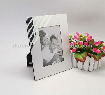 High polish aluminum and clear plastic photo frame