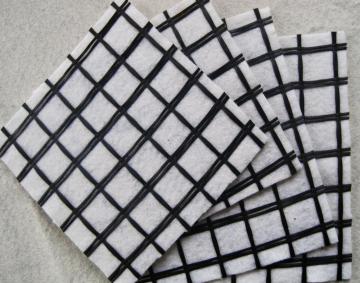 Fiberglass composite nonwoven geotextile for reinforcement