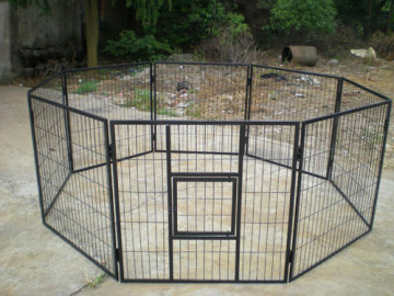 Black Metal Pet Cage In Garden