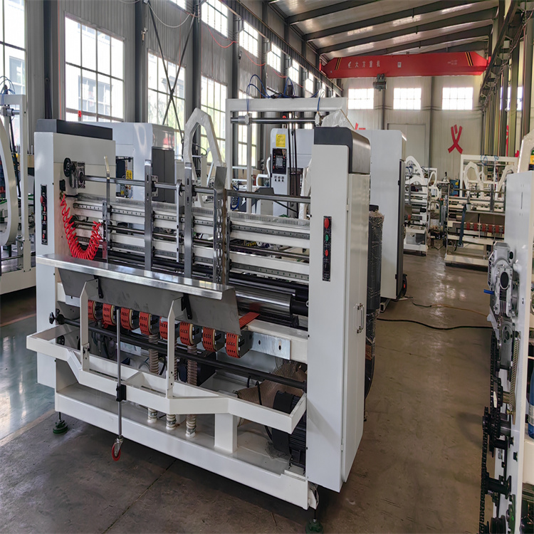 Automatic feeding corrugated carton gluing and stitching machine