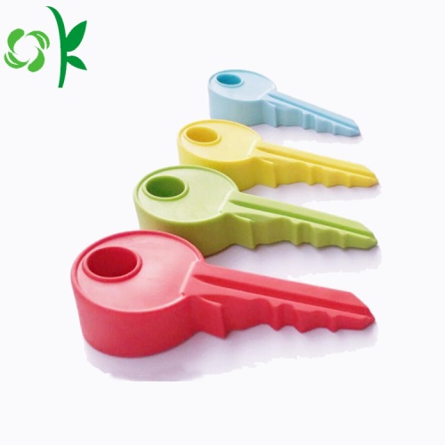 Touche de porte en silicone anti-pincement avec forme de clé