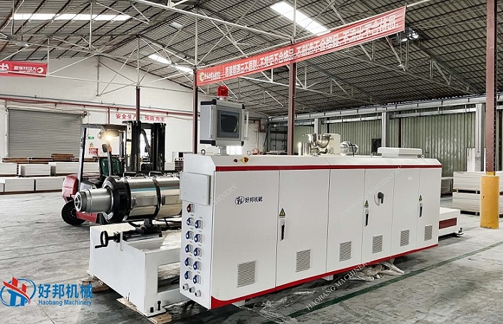 High capacity SPC floor production machine