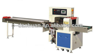 Down-film flow packing machine for spoon