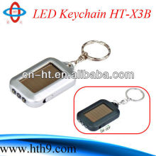 2013 hot sale mini rechargeable led solar keychain flashlight