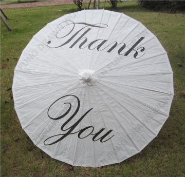 beautiful white wedding decoration umbrellas