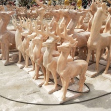 Hand carved stone deer sculpture