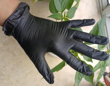 Disposable black vinyl glove