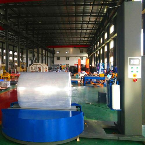 Automatic reel film wrapping machine