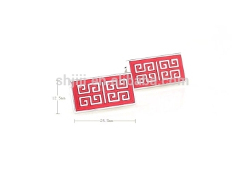 Silver Logo Cufflinks Engraved In Red Background