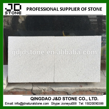 bush-hammered white sandstone paver