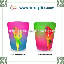 Rainbow shot glass with polyresin parrot