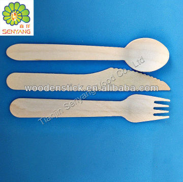 kitchen fruit steak cutlery wooden spoon fork knife