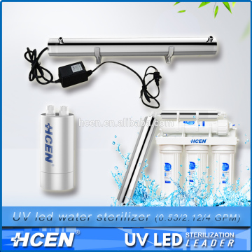 Over flow water treatment system with led uvc sterilizer