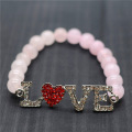 Bracelet de pierres précieuses tendues avec perles rondes en quartz rose 8MM avec pièce d&#39;amour Diamante