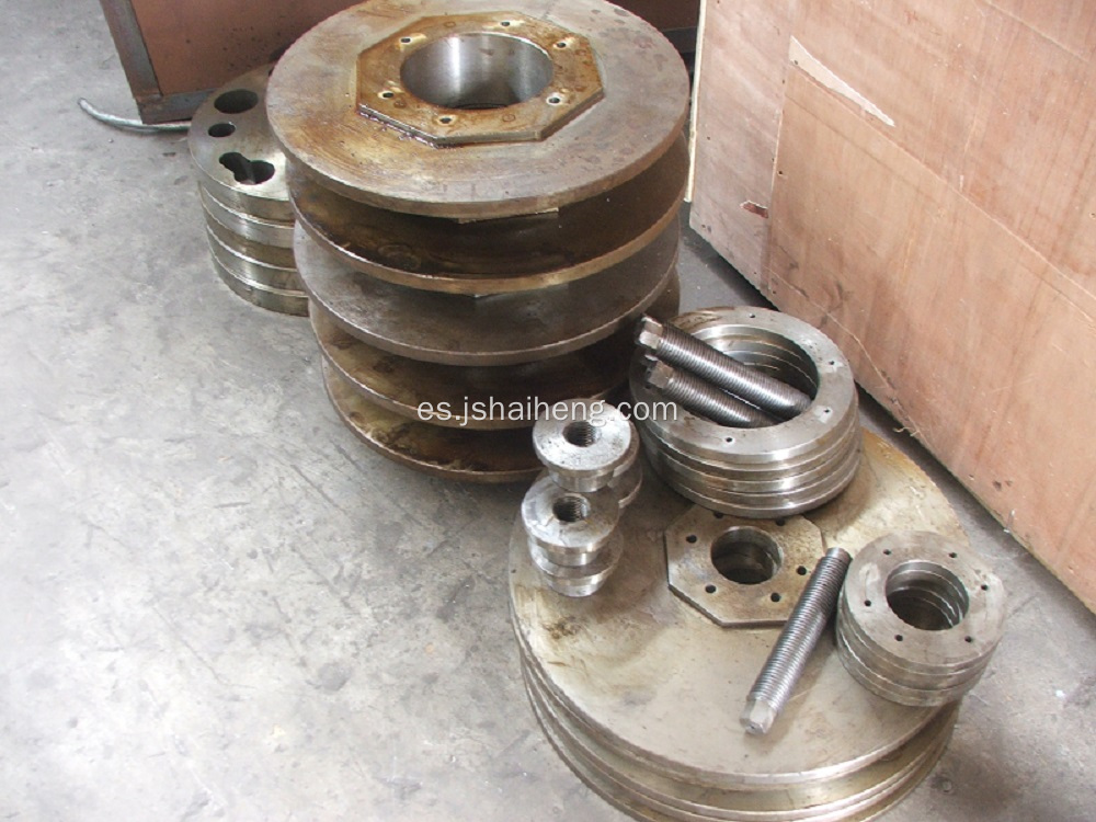 Dispositivo de tensión para la pila hilada