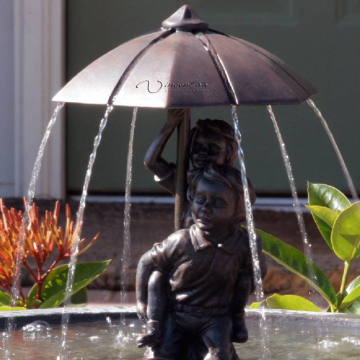 Bronze boy and girl under umbrella fountain boy and girl garden statue