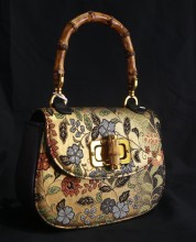 Bamboo Handle Golden Silk Clutch