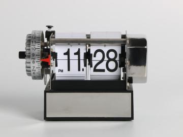 Flip Turning Alarm on Table